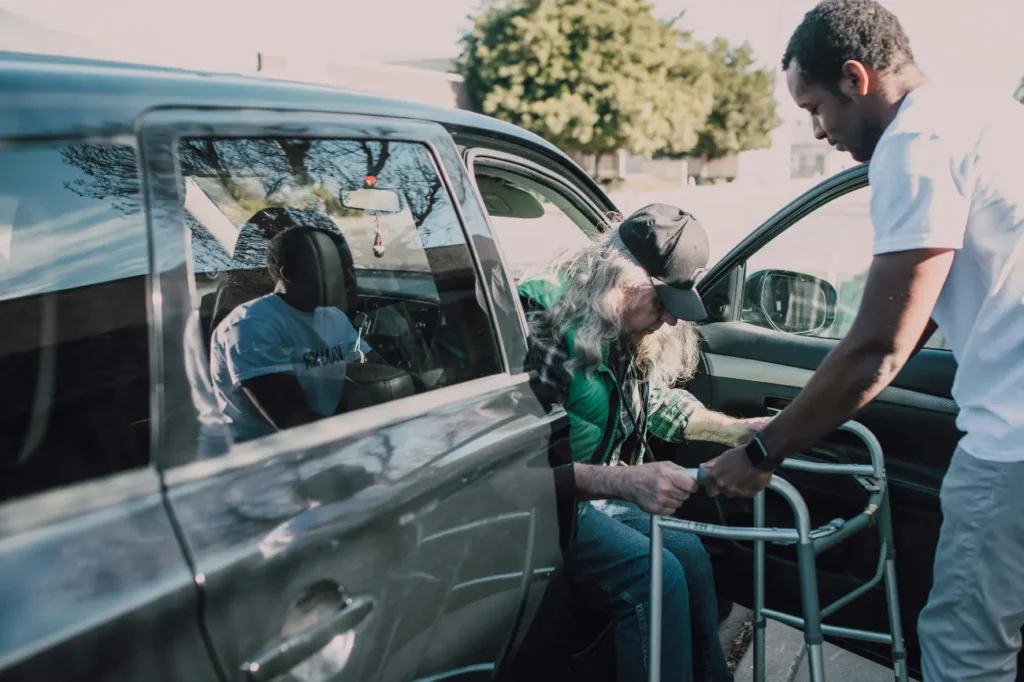 Medical Transportation Services assisting patient arriving at physician appointment safely and on time”